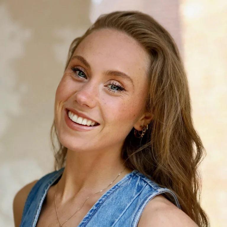 Headshot of Maisie Morris, smiling.