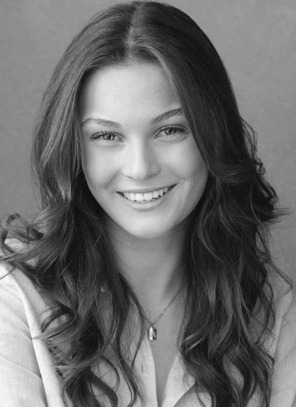 Headshot of Amy McEvoy, smiling, in black and white.