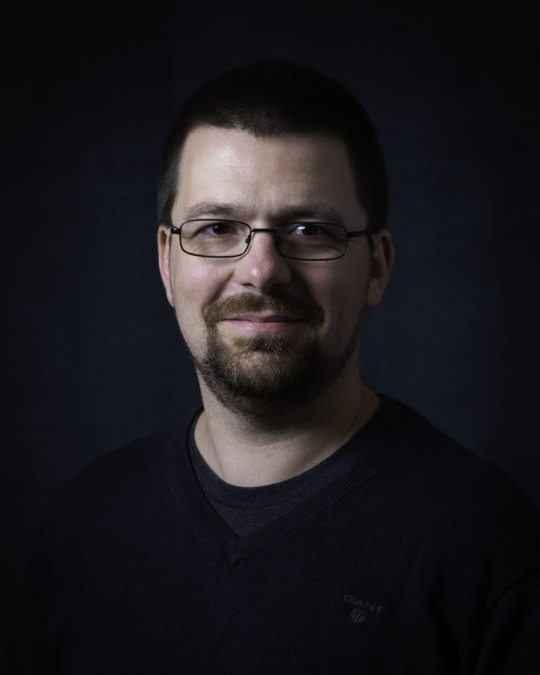 Headshot of Christian Ashby.